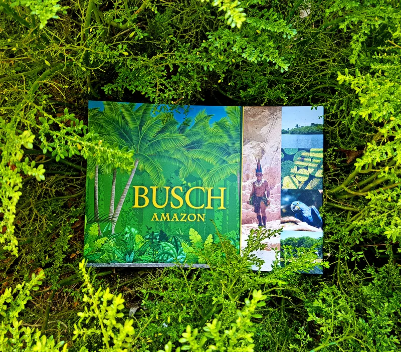Busch Amazon material resting on green foliage.